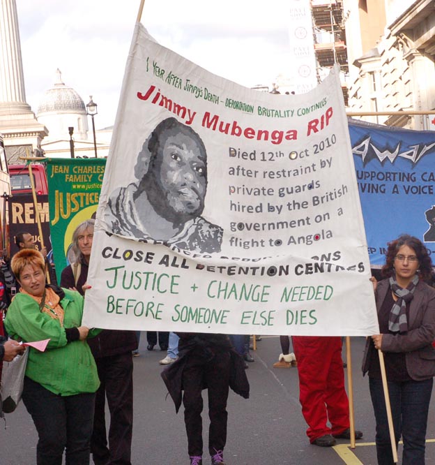 The banner of Jimmy Mubenga a 46-year-old Angolan who died after being forcibly restrained by G4S guards as he was being deported on a flight to Angola in October 2010