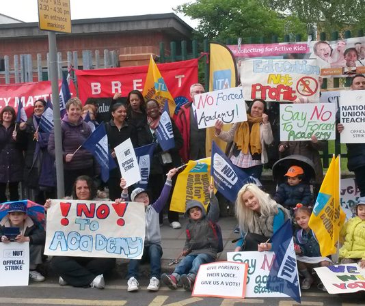 Pupils, parents and teachers demonstrated outside St Andrew & St Francis Primary School during a teachers’ strike against the school being forced to become an academy