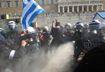 Greek farmers attacked by riot police while protesting against a massive attack on pensions imposed on Greece by the European Union Photo credit: Marios Lolos