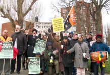 A strong and determined mass picket at Ealing Hospital yesterday morning vowed that action will be taken to stop the closure