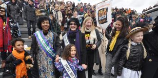 HELEN PANKHURST, great-granddaughter of suffragette founder, Emmeline (centre left, in hat) next to RACHEL HOLMES  (centre, author of ‘Eleanor Marx: A Life’) with the crowd at the ‘Walk in Her Shoes’ rally