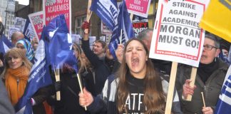 Teachers vent their anger last Wednesday night outside the Department of Education