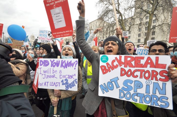 Junior doctors demonstrating outside Downing Street – over 2,000 doctors have sent a letter to Cameron and Hunt giving their full support to the junior doctors’ struggle