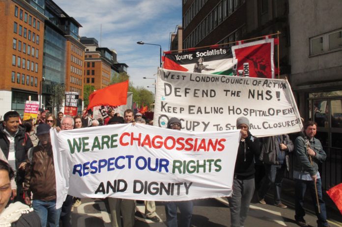 Chagossians demanding the right to return to their homes in the Indian Ocean island of Diego Garcia marching alongside the West London campaign to keep Ealing Hospital open