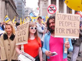Workers demanding an end to benefit cuts – The government’s Universal Credit means millions of people receiving less money