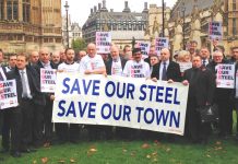 Port Talbot steel workers outside parliament demanding action to save the steel industry – a thousand march tomorrow