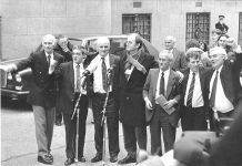 JOHN WALKER, PADDY HILL, HUGH CALLAGHAN, Labour MP CHRIS MULLEN, RICHARD McILKENNY, GERRY HUNTER and BILLY POWER outside the Old Bailey after their convictions for the Birmingham pub bombings were quashed on March 14, 1991