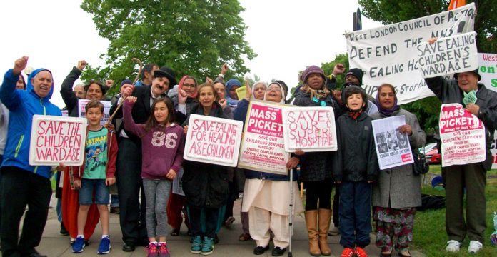 Children joined the 50-strong mass picket outside Ealing Hospital yesterday morning calling for strike action and occupation to save the Charlie Chaplin children’s ward