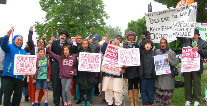 Children at the front of last Friday’s early morning mass picket at Ealing Hospital which called for an occupation to stop the closure of the Charlie Chaplin children’s ward