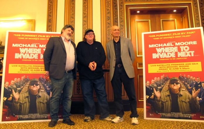 After the press conference, producer Carl Deal (left), Michael Moore and executive producer Rod Birleson (right)