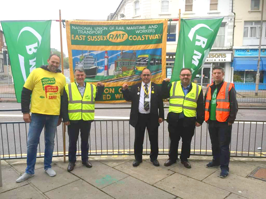 MICK CASH RMT general secretary (second from left) joined the RMT picket line at Eastbourne yesterday morning