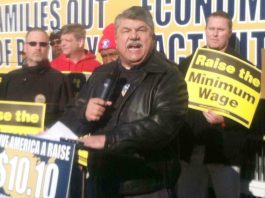 Verizon workers on the picket line – they have won a pay rise and the company will employ a larger workforce