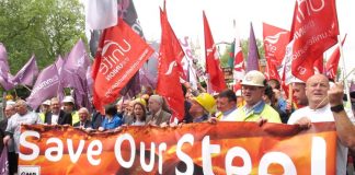 Labour leader CORBYN (centre) with trade union leaders at a demonstration of steelworkers in London