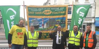 RMT General Secretary MICK CASH (second from left) on the picket line at Eastbourne during the Southern rail strike on June 21st