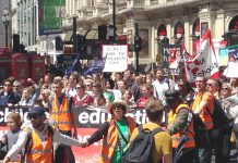 Thousands of teachers march through central London yesterday during their nationwide strike against savage cuts