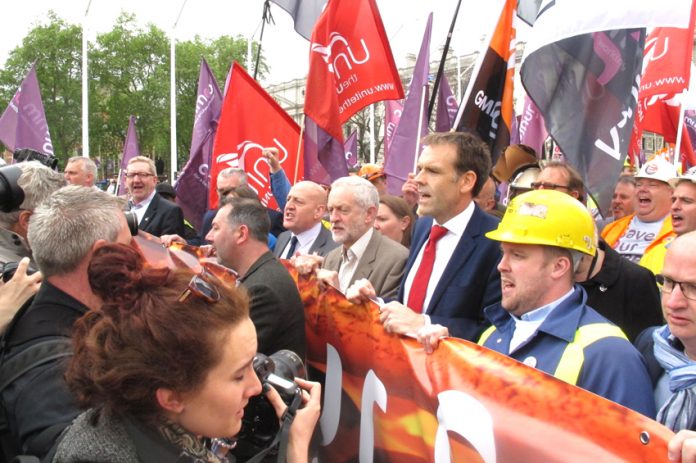 Jeremy Corbyn marches with steel workers through London