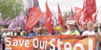 Labour leader CORBYN marching with steelworkers in London in May