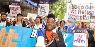 Student nurses marching in London last month shouting ‘Hand off our bursaries!’ – the RCN calls for all the cuts to be halted