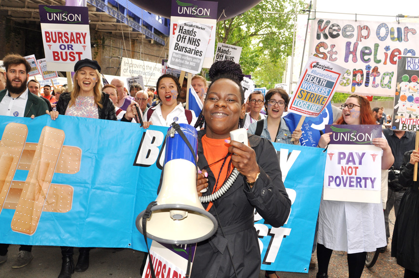 Student nurses marching in London last month shouting ‘Hand off our bursaries!’ – the RCN calls for all the cuts to be halted