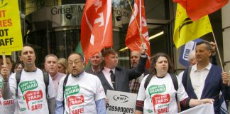 RMT members and supporters demonstrating outside the Department for Transport yesterday morning – later on in the afternoon the government conceded there would be talks at Acas