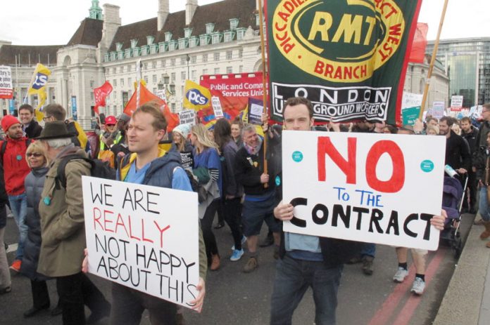 Teachers and doctors called a joint march at which PCS, RMT, FBU and ASLEF attended – all unions must strike together to defend the NHS