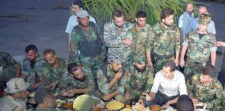 Assad breaks his fast with Syrian troops during Ramadan