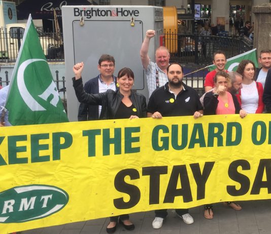 Southern rail workers during their strike to keep the guard on the train picketing outside Brighton station earlier this month