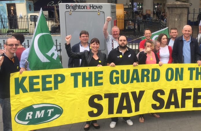 Southern rail workers during their strike to keep the guard on the train picketing outside Brighton station earlier this month