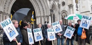 NUJ protest outside London’s High Court in 2012 as police tried to force photographers covering the eviction of Travellers from their site at Dale Farm in east London to hand over all their images of the eviction