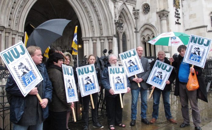 NUJ protest outside London’s High Court in 2012 as police tried to force photographers covering the eviction of Travellers from their site at Dale Farm in east London to hand over all their images of the eviction