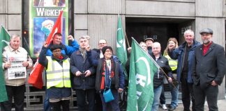 TUC deputy general secretary PAUL NOVAK (back row, centre) was among the enthusiastic pickets at Victoria Station yesterday morning. He brought the support of the General Council