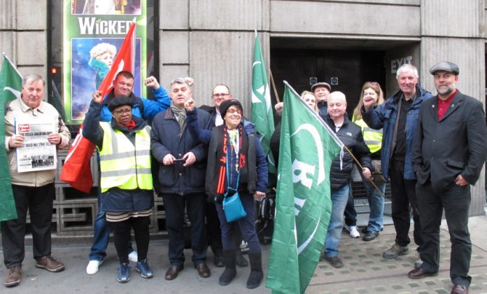 TUC deputy general secretary PAUL NOVAK (back row, centre) was among the enthusiastic pickets at Victoria Station yesterday morning. He brought the support of the General Council