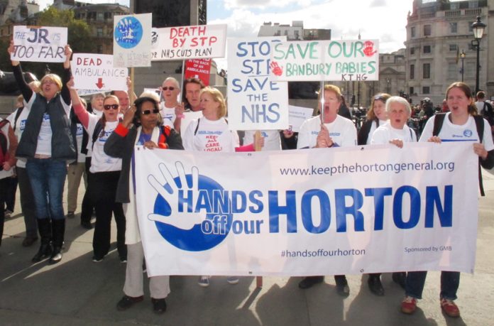 ‘Hands off our Horton’ demand demonstrators from North Oxfordshire in Trafalgar Square, London on October 10th