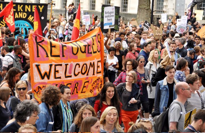 A demonstration of over 100,000 marched through London to welcome refugees in September 2015