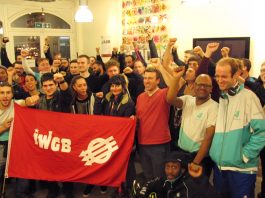 Deliveroo riders at Tuesday night’s meeting with the Independent Workers Union of Great Britain banner