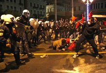 Riot police attack workers and youth in Athens on Tuesday night. Photo credot: MARIOS LOLOS