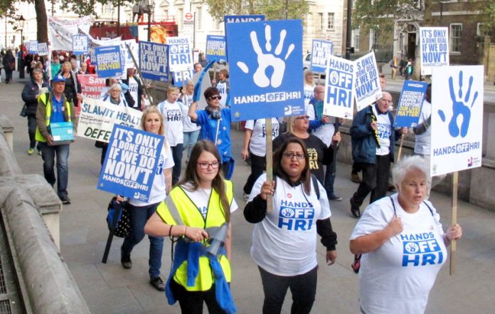 Workers from Huddersfield Royal Infirmary marching to 10 Downing Street to tell PM May that their hospital must remain open and fully functioning