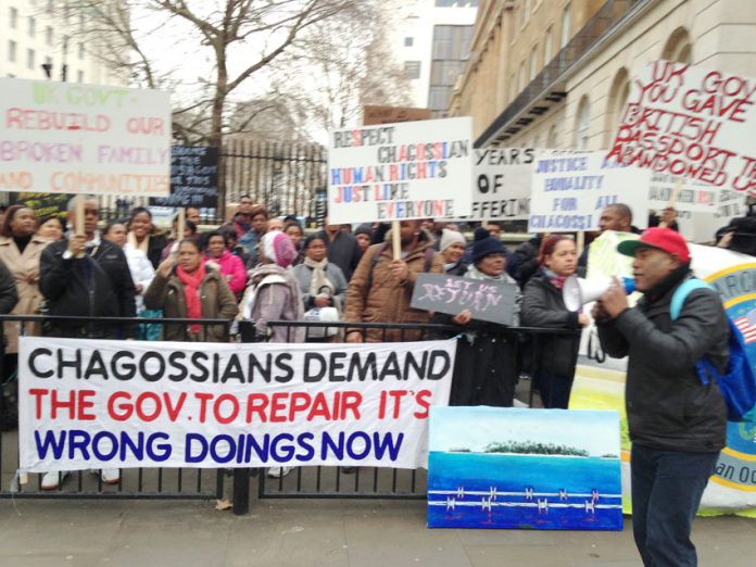 Hundreds of Chagossians rally outside the Foreign Office condemning the British government for preventing them from returning home to the Chagos Islands