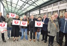 Postal workers among the 100-strong rally outside the Department of Business, Energy and Industrial Strategy demanding no closures of Crown Post Offices