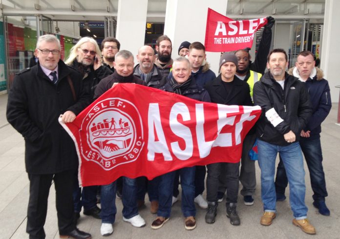 Lively ASLEF picket line at London Bridge Station yesterday morning – Southern rail was brought to a complete standstill
