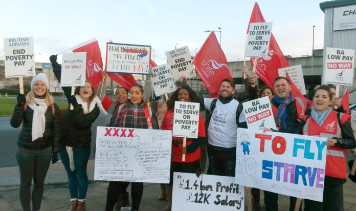 Striking British Airways mixed fleet cabin crew on the picket line at Heathrow Airport yesterday morning