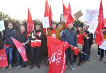 Striking BA cabin crews leaving yesterday’s early morning rally to set up picket lines around Heathrow Airport