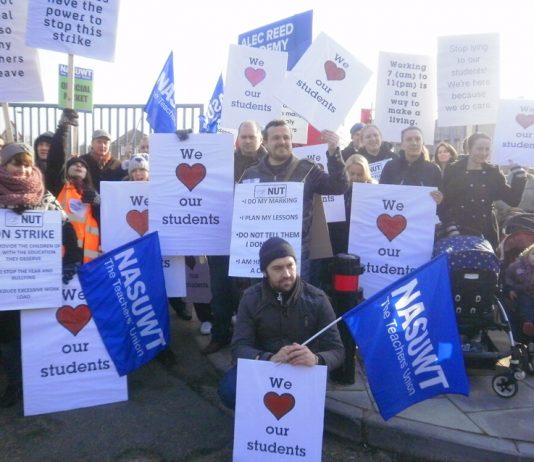 Teachers were joined by parents on the picket line at Alec Reed Academy during their strike against harassment and bullying