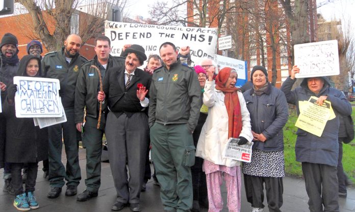 Ambulance workers joined the mass picket of Ealing Hospital yesterday morning to stop the closure of the A&E and demand the maternity and children’s wards be re-opened