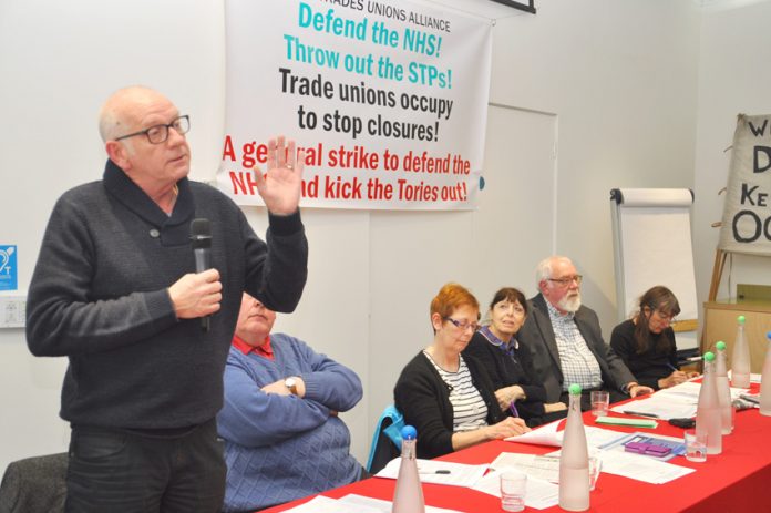 CHARLES HARRITY senior GMB organiser for Surrey, Sussex and Kent speaking at the ATUA conference on the struggle against privatisation of the Ambulance service