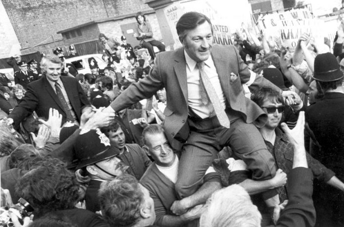 The anti-union laws that Tory Premier Heath introduced were smashed when the mass movement for a general strike forced the release of five imprisoned dockers – picture shows BERNIE STEER and VIC TURNER being liberated from Pentonville Prison