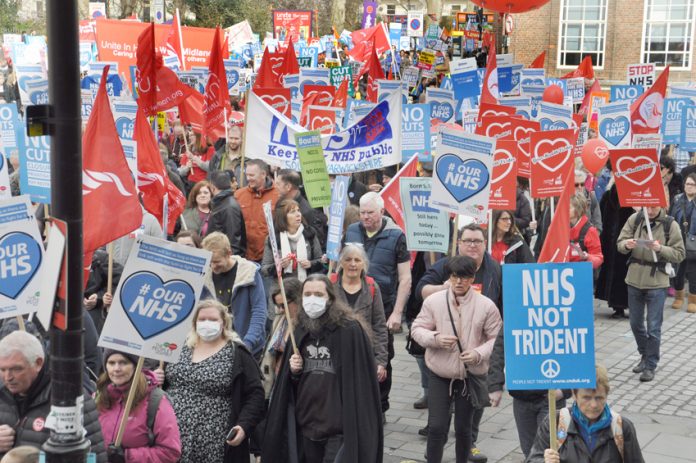 A section of the 100,000-strong march to Downing Street in the defence of the NHS