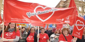 NHS health visitors on Saturday’s demonstration to defend the NHS – doctors are demanding £10.3bn extra funding for the NHS and social care