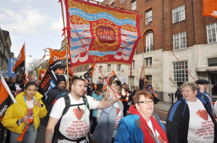 GMB members marching to defend the NHS – the GMB is playing a leading role in the fight against the privatisation of Barnsley Hospital