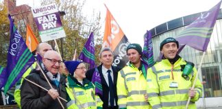 NHS ambulance workers picket their London HQ over wages and jobs